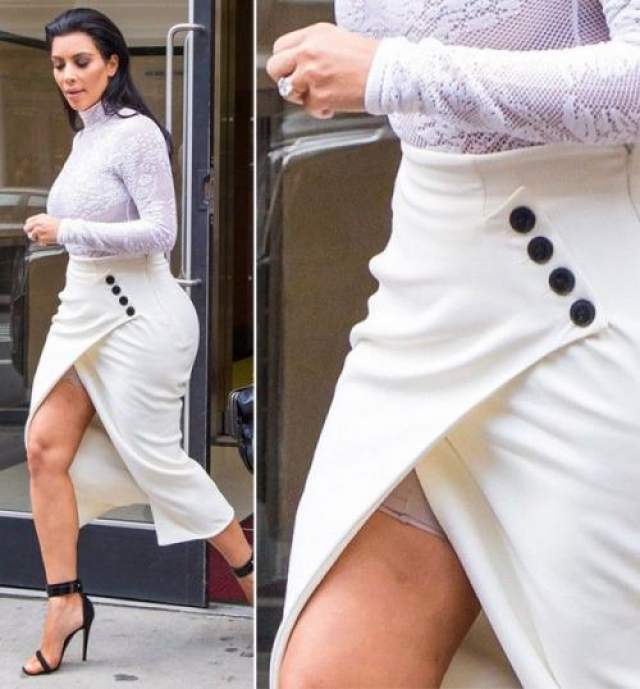 Звезда американского телевидения Ким Кардашьян-Уэст (38) втиснула свои всемирно известные формы в наряд Christian Dior. В этом непростом деле, как мы можем убедиться, ей помогли выглядывающие из под юбки утягивающие панталоны. 